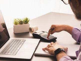 Verifactu-mature-man-working-from-home-office-on-finances-2026-03-20-01-04-47-utc